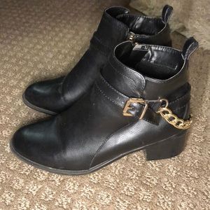 Black and gold booties